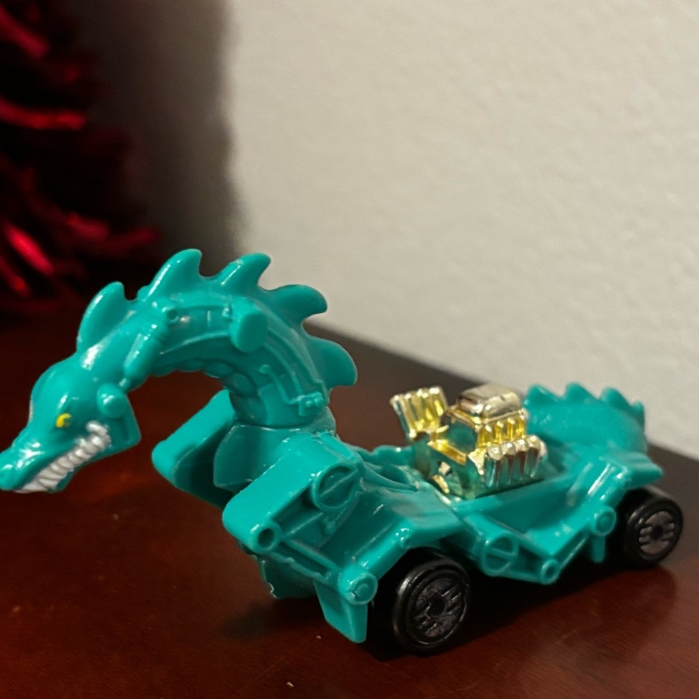 Head turning Hot Wheels Teal Dragon Adventure Car.